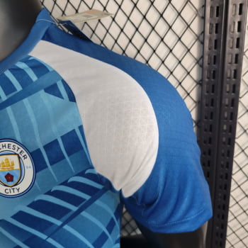 Camisa Manchester City 23/24 Versão Jogador Pré-Jogo - Azul