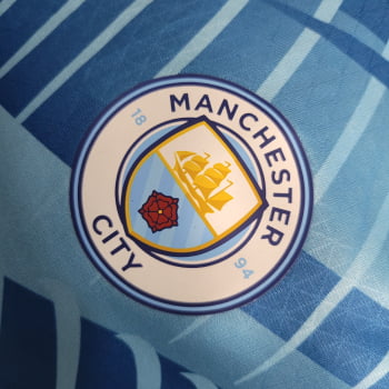 Camisa Manchester City 23/24 Versão Jogador Pré-Jogo - Azul