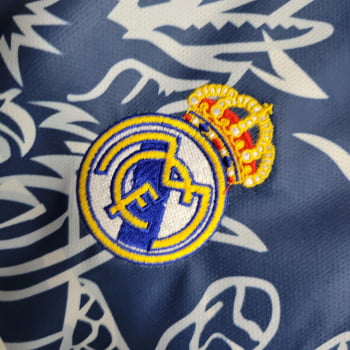 Camisa Gola Polo Real Madrid 23/24 Ed. Especial Dragão Azul Camisa Gola Polo Real Madrid 23/24 Ed. Especial Dragão Azul