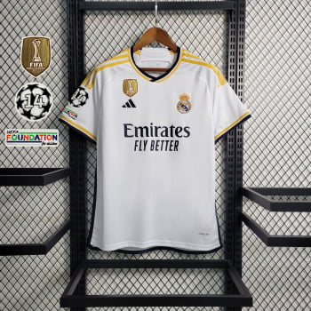 Camisa Real Madrid I 23/24 Versão Torcedor + Patchs + Personalização Grátis Camisa Real Madrid I 23/24 Versão Torcedor + Patchs + Personalização Grátis